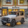 White Land Rover Defender In City Streets Paint By Numbers